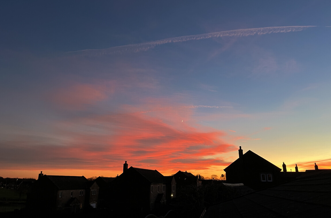 Sunset, Moon, and Contrails